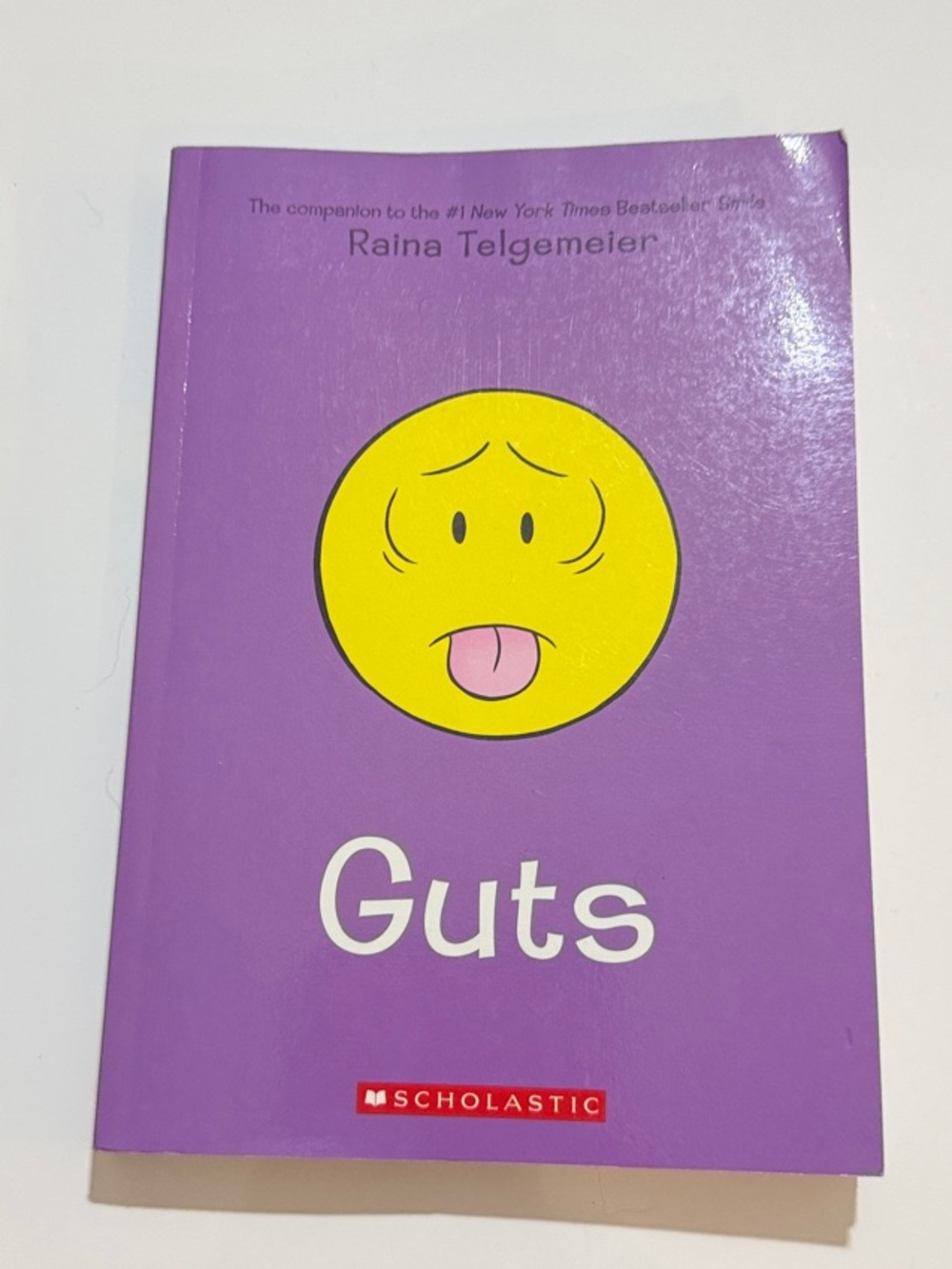 Scholastic Purple Paperback: Guts by Raina Telgemeier